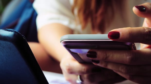 Close up image of Woman Using a Smart Phone