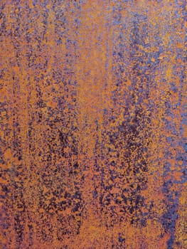 Rusty metal background with rough texture in brown tones