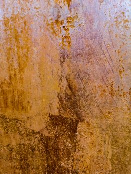 Rusty metal background with rough texture in brown tones