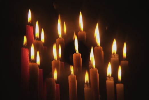 Candles flame close up on a black background