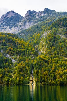 Small waterfall in Alp mountains near lake Koenigssee, Konigsee, Berchtesgaden National Park, Bavaria, Germany.