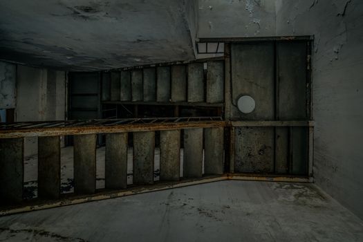 The abandoned industrial building. Fantasy interior scene. Shot in an abandoned ruin.