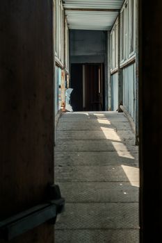 The abandoned industrial building. Fantasy interior scene. Shot in an abandoned ruin.