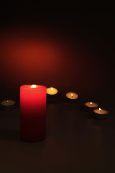 Candles flame close up on a black background