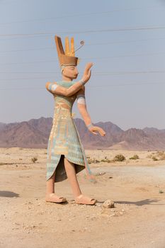 an statute at the entrance of the timna natinal park in israel