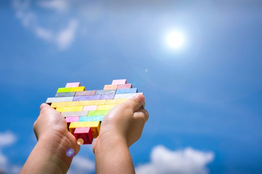 A Heart put Together with Various Colored Building Blocks