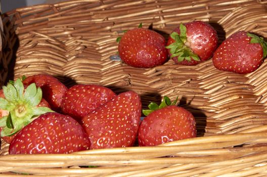 Strawberries in a cane basket, long exposure with natural light