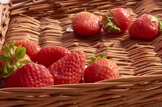 Strawberries in a cane basket, long exposure with natural light