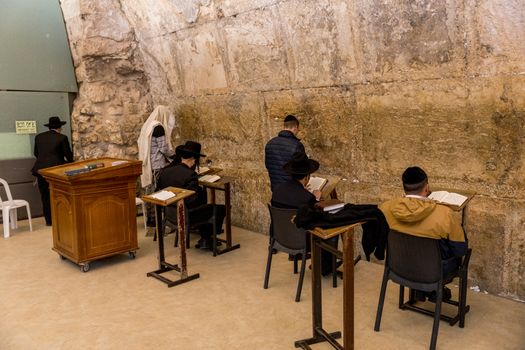 Jerusalem,Israel,27-march-2019:Jewish man inside the wailing wall in jerusalem at the Western Wall in Jerusalem. Israel, the part where only man can go in