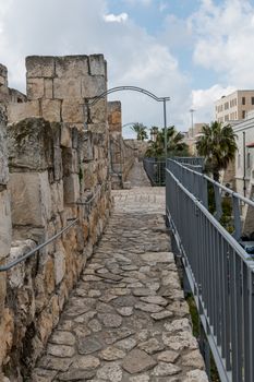 view from a walking tour over the western wall with view on the city