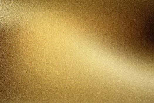 Gold polished metal wall, abstract texture background