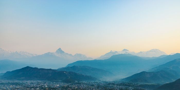 Panoramic view of the Machapuchare and the Annapurnas at sunrise from Sarangkot in Nepal
