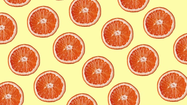 Grapefruit pattern on yellow background. Minimal flat lay concept. Top view