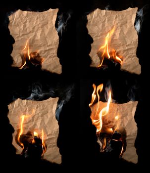 burning piece of crumpled paper on black background