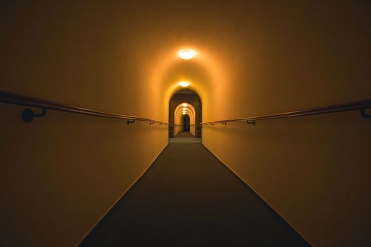 Wide Shot of a long dark tunnel, creepy underground scene.