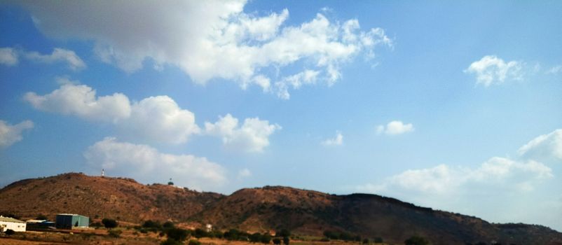 Landscape with Mountain, clouds and trees clicked during my visit to Hyderabad.