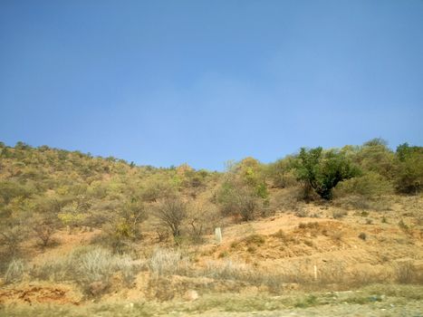 Landscape with Mountain, sky and trees clicked during my visit to Hyderabad.