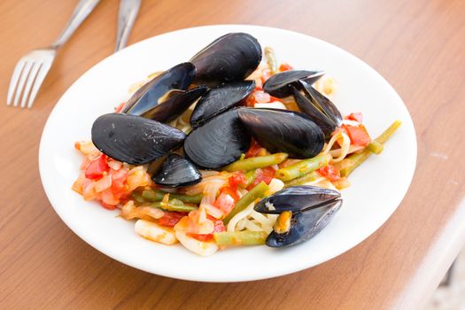 Seafood mussels ready to eat on a plate