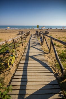 Nice wooden road to beach, sunny day, nice blue sky