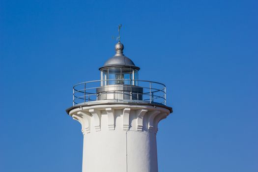 Top of the lighthouse with nice blue sky in background