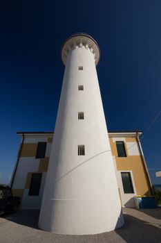 Tall lighthouse with nice dark blue sky