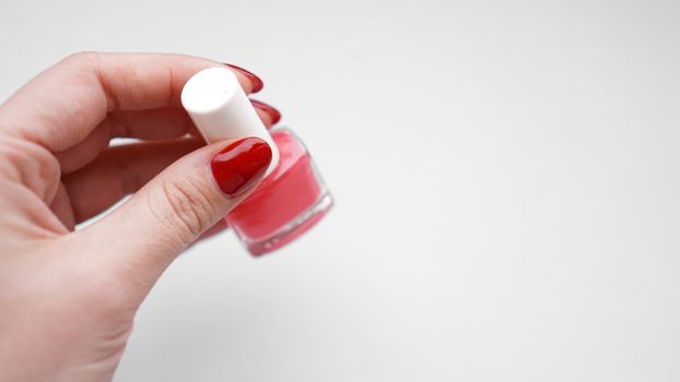 Manicure - Beautiful manicured womans nails with red nail polish