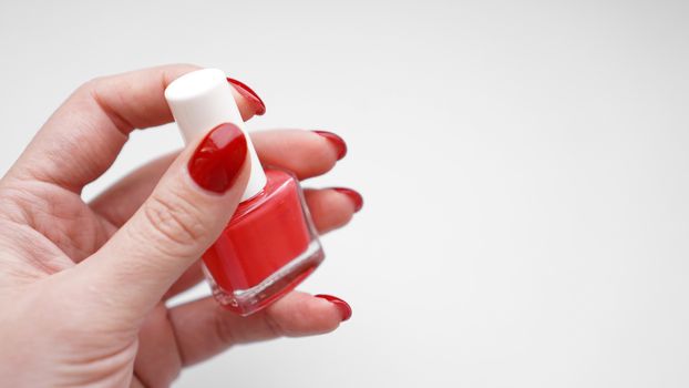 Manicure - Beautiful manicured womans nails with red nail polish