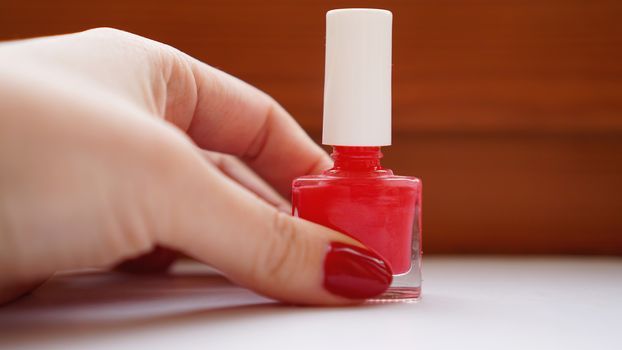 Manicure - Beautiful manicured womans nails with red nail polish