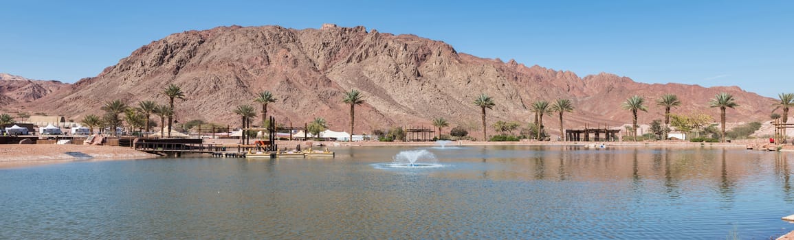 water and mountains and a lake in timna national park in south israel