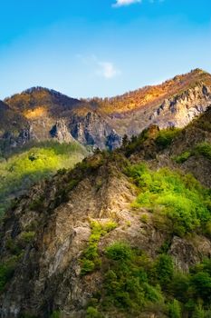 Carpathian mountains under blue sky in Romania