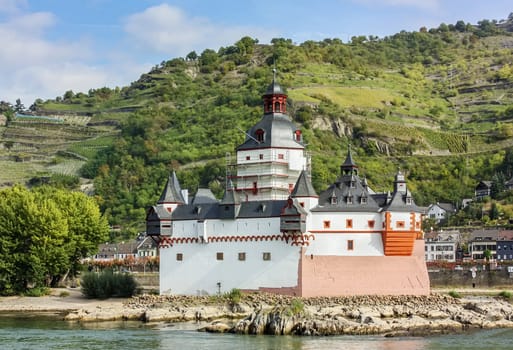 Pfalzgrafenstein Castle is a toll castle on the Falkenau island, otherwise known as Pfalz Island in the Rhine river near Kaub, Germany.