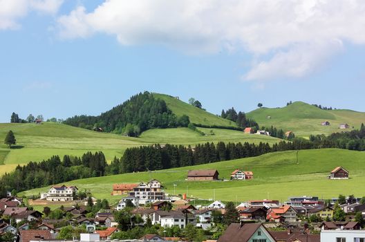 view of Appenzell city and the surrounding green hills,Switzerland