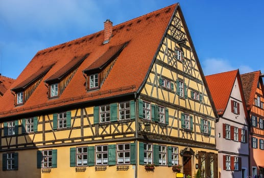 Street with historic houses in the Dinkelsbuhl city center. Dinkelsbuhl is old Franconian town, one of the best-preserved medieval urban complexes in Germany. 