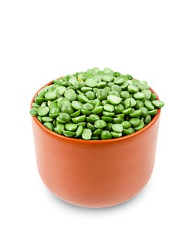 organic green split peas filling a small bowl isolated on a white background. Save clipping path.