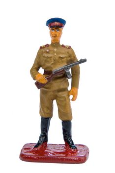 Toy soldier on a white isolated studio background