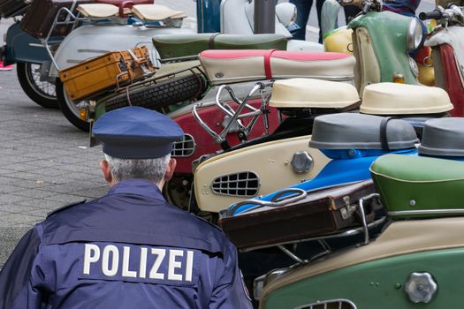 German police, locking and securing a crime scene.