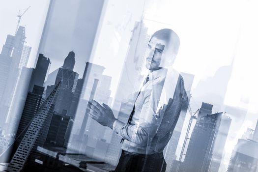 Business man making presentation in corporate office. Business executive delivering a presentation during business meeting against new york city manhattan buildings and skyscrapers window reflection.