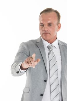 Businessman pointing his finger on empty copy space, isolated over white background