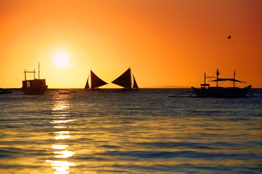 Traditional Philippine boats on sunset. Island Boracay