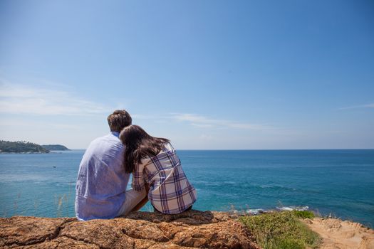 Young couple enjoy beautiful sea view on vacation