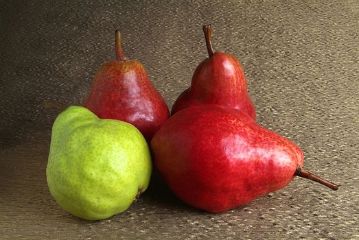 pears and apples on wooden table, autumnal still life