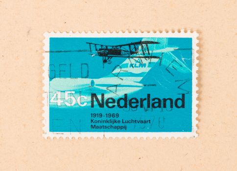 THE NETHERLANDS 1970: A stamp printed in the Netherlands shows 50 years of aviation by KLM, circa 1970