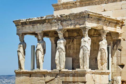 The Erechtheion is an ancient Greek temple on the north side of the Acropolis of Athens in Greece which was dedicated to both Athena and Poseidon.