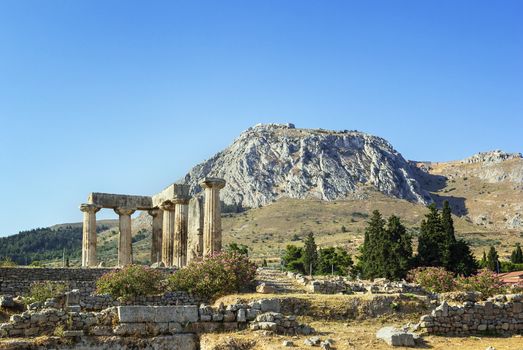 The ruins of the Temple of Apollo in ancient Corinth, Greece