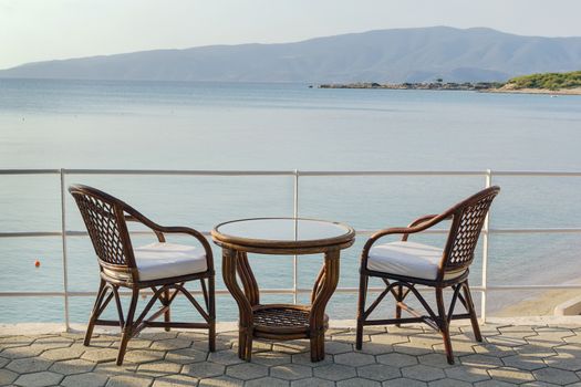 table and chairs for rest overlooking the sea