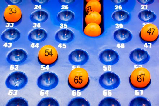 Blue Plastic Panel with Orange Bingo Balls 