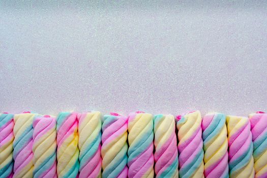Colorful Twisted Marshmallows Lined up in a Row