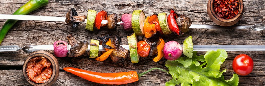 Grilled vegetable shish kebab with peppers and mushrooms.Long banner.Summer food