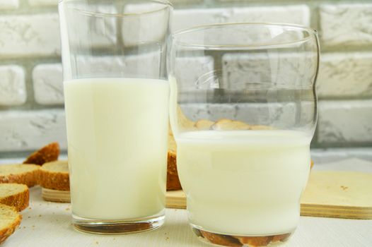 Two glasses of milk are on the table, Breakfast for the family, healthy eating concept, world health day.