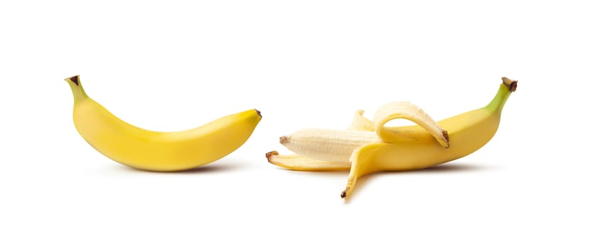 Two banana. Whole and peeled banana isolated on white background